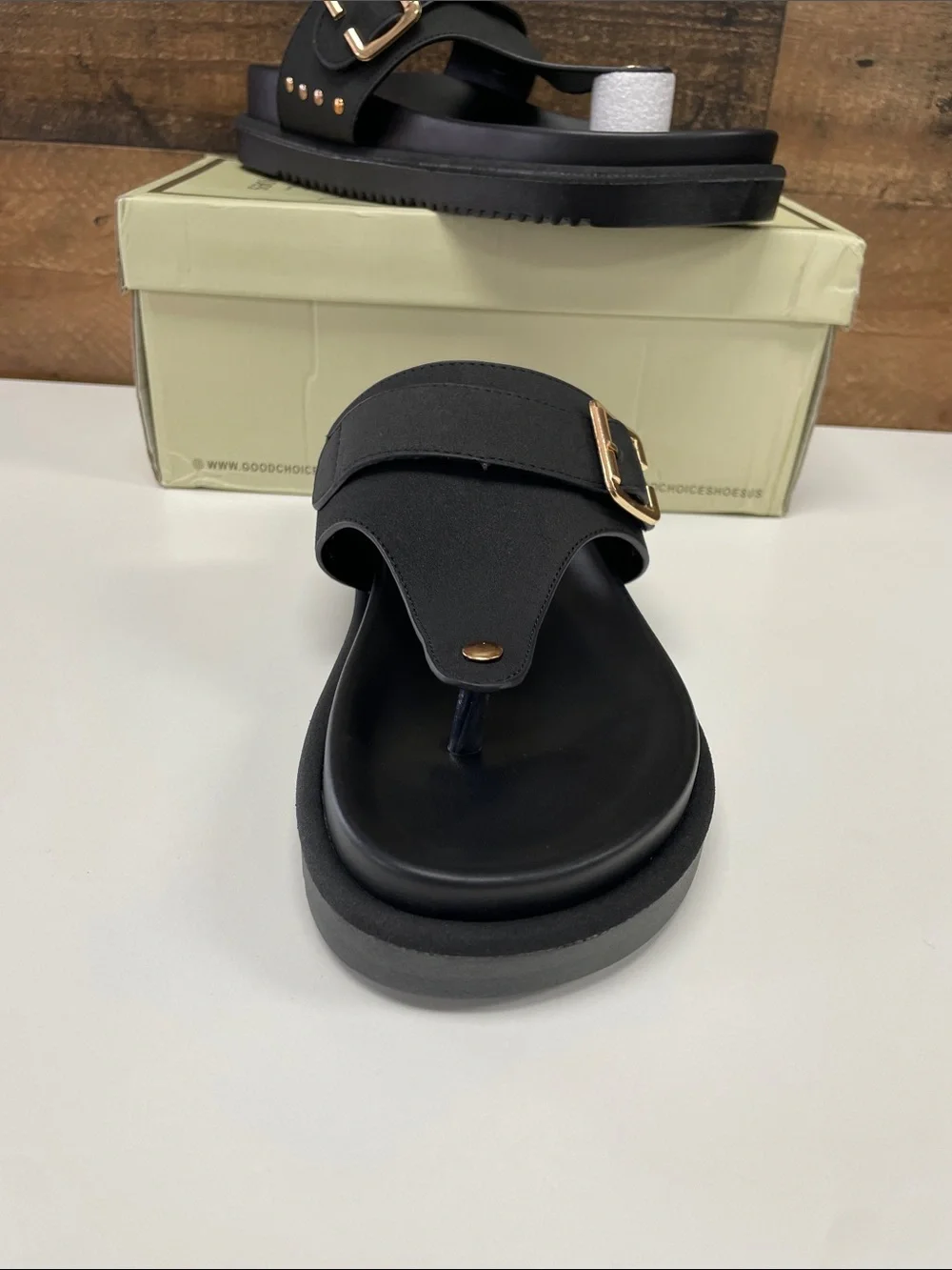 Women’s Black Thong Sandals with Gold Buckle Accent